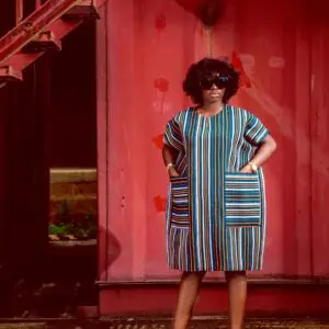 lady wearing a dress made from Aso oke